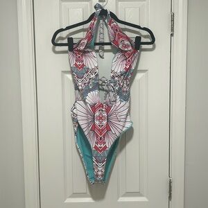 Geometric deep plunge. Reversible. Swimsuit. Size L.